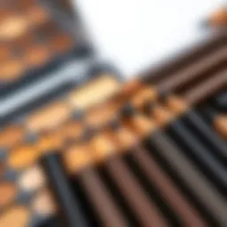 A beautifully arranged palette of ash brown brow pencils showcasing various shades.