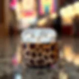 Stylish cheetah print AirPods case showcasing its unique design.