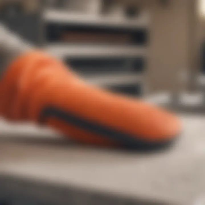 High-temperature silicone oven mitt demonstrating flexibility