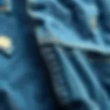 A close-up of distressed denim fabric showcasing unique textures and patterns