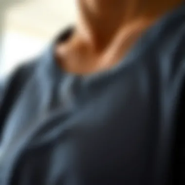 Detailed view of scoop neck rib henley shirt fabric texture