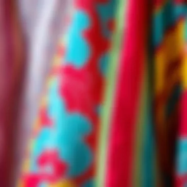 A close-up of the fabric texture of a kimono cardigan, highlighting the lightweight material and vibrant colors perfect for summer wear.