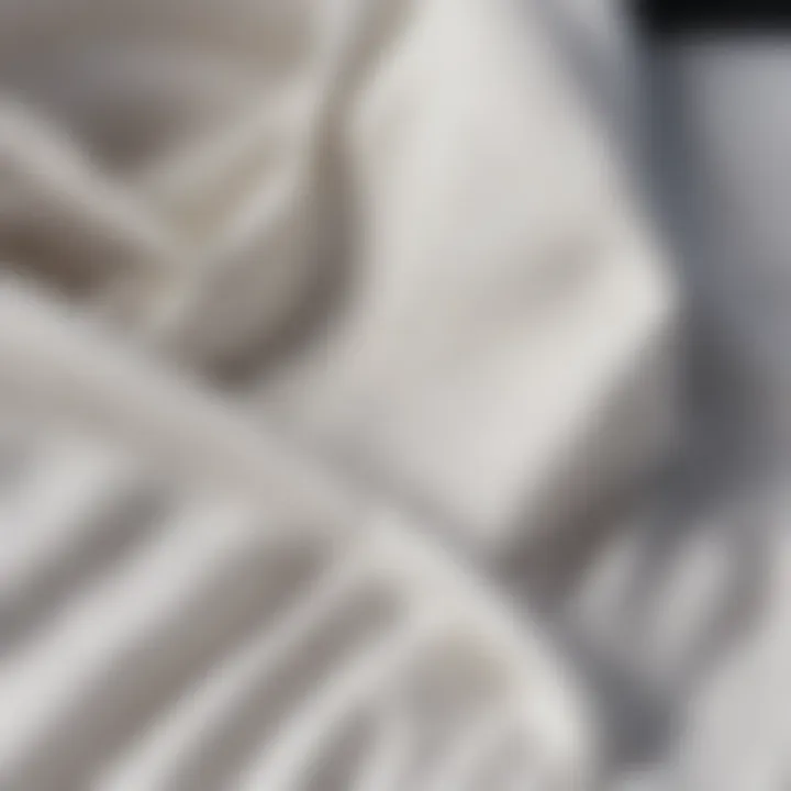 Close-up of sustainable fabric used in the white jumpsuit