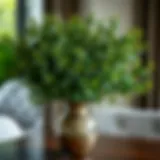 Lush faux boxwood stems elegantly arranged in a decorative vase