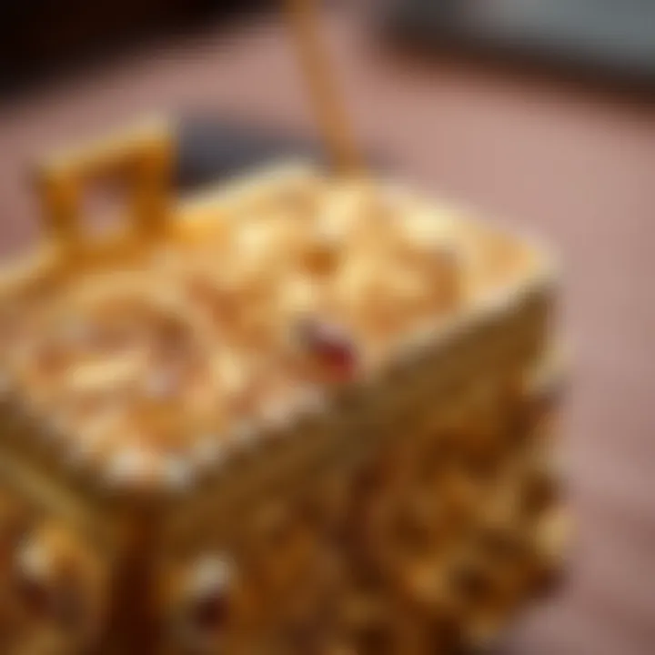 Close-up of intricate design patterns on a gold rhinestone purse