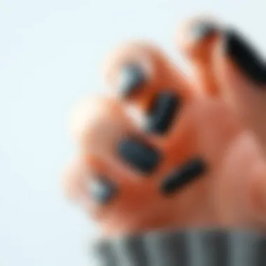 Maintenance Tips for Black French Tip Press-On Nails Close-up of well-maintained black French tip press-on nails