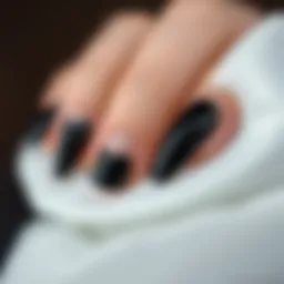 Elegant black heart nail stickers on a manicured surface