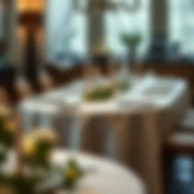 Artfully Set Dining Table with Handcrafted Linen A beautifully set dining table with a handcrafted tablecloth