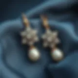 Elegance in Detail: Rhinestone and Pearl Earrings Intricate rhinestone and pearl earrings showcased on a luxurious fabric background