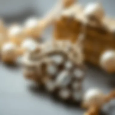 Close-up view of a vintage pair of rhinestone and pearl earrings, emphasizing craftsmanship