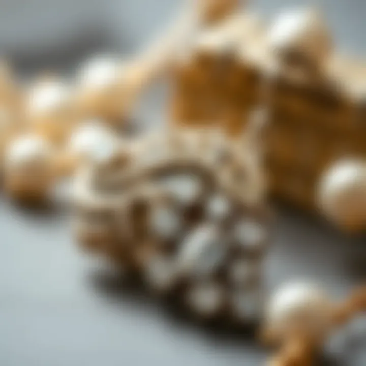 Close-up view of a vintage pair of rhinestone and pearl earrings, emphasizing craftsmanship