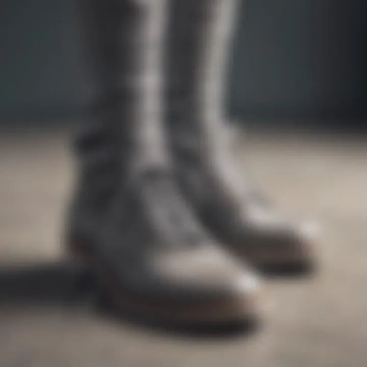 A close-up view of gray round shoelaces showcased against various footwear styles.