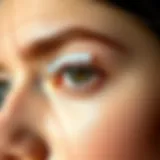 Close-up view of transparent eyelid tape applied on eyelids