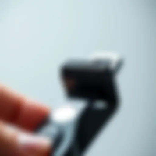 A close-up view of a grooming tool designed for trimming armpit hair.