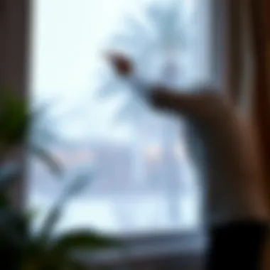 Installation process of light blocking window cling on a large window