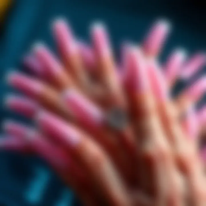 An elegant display of various pink ombre glue-on nail styles arranged aesthetically.